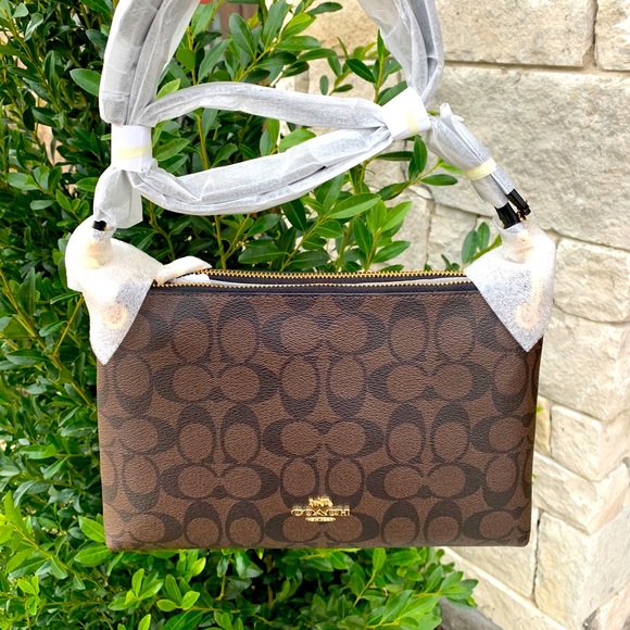 mia crossbody in signature canvas